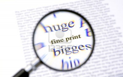 2730948-une-loupe-zoom-sur-le-texte-fine-print-sur-une-feuille-de-papier-entoure-par-plus-de-lettres-l-39-ab